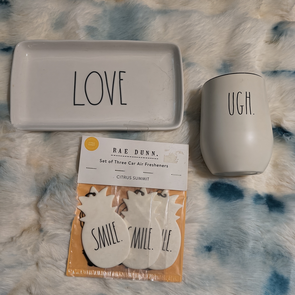 Rae Dunn white ceramic "LOVE" tray, "UGH." tumbler, and pineapple air fresheners
